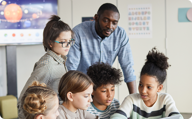 Children learning with teacher
